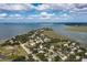 An aerial view showing the home near a body of water at 1302 Middle St, Sullivans Island, SC 29482