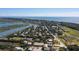 Scenic aerial view highlighting the property's location in a charming coastal neighborhood with water access and green spaces at 1302 Middle St, Sullivans Island, SC 29482