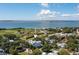 Aerial view showing a beautiful home with scenic ocean views and historical site at 1302 Middle St, Sullivans Island, SC 29482