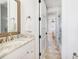 Inviting bathroom featuring a stone vanity and easy access to the shower and bedroom at 1302 Middle St, Sullivans Island, SC 29482