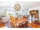 Dining room featuring a large wood table, decorative lighting, and a view at 1302 Middle St, Sullivans Island, SC 29482