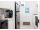 Efficient laundry area with modern appliances, ample counter space, and bright lighting at 1302 Middle St, Sullivans Island, SC 29482