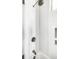 Modern walk-in shower features white subway tile and sleek fixtures at 1302 Middle St, Sullivans Island, SC 29482