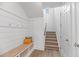 Entryway features bench seating with storage and staircase leading to the upper level at 1530 Homecoming Blvd, Ravenel, SC 29470