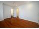 Empty bedroom featuring hardwood floors and an ensuite bathroom at 1637 Tatum St, Charleston, SC 29412