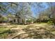 Charming one story brick home with a well manicured lawn and mature trees in a desirable neighborhood at 1637 Tatum St, Charleston, SC 29412