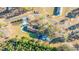 A home with nice landscaping and trees, offering a serene and private setting at 165 Infinity Dr, Dorchester, SC 29437