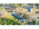 A home with nice landscaping and trees, offering a serene and private setting at 165 Infinity Dr, Dorchester, SC 29437
