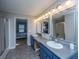 Spacious bathroom featuring double vanity sinks, a separate glass shower, and a tub at 165 Infinity Dr, Dorchester, SC 29437