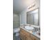 Bathroom featuring a shower-tub combo, a framed mirror, and a marble-look vanity at 165 Infinity Dr, Dorchester, SC 29437