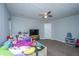 Bedroom featuring carpet, natural light, ceiling fan, TV and personal items at 165 Infinity Dr, Dorchester, SC 29437