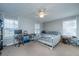 Comfortable bedroom with lots of natural light, a ceiling fan, and functional workspace at 165 Infinity Dr, Dorchester, SC 29437