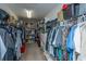 Organized walk-in closet with ample hanging space and shelving for efficient storage at 165 Infinity Dr, Dorchester, SC 29437