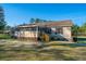 Charming single-story home with a screened-in porch and well-maintained yard at 165 Infinity Dr, Dorchester, SC 29437