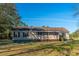 Charming single-story home with a screened-in porch and well-maintained yard at 165 Infinity Dr, Dorchester, SC 29437