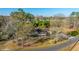 A beautiful front yard with well-maintained landscaping and mature trees on a sunny day at 165 Infinity Dr, Dorchester, SC 29437