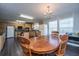 Bright kitchen with wood cabinets, modern appliances and a charming dining area at 165 Infinity Dr, Dorchester, SC 29437