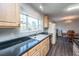 Kitchen with bright light featuring stainless appliances and a sink near the window at 165 Infinity Dr, Dorchester, SC 29437
