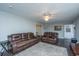 Bright living room boasts ample natural light, plush sofas, and open layout at 165 Infinity Dr, Dorchester, SC 29437
