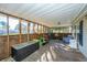 Screened-in porch providing additional outdoor living space at 165 Infinity Dr, Dorchester, SC 29437