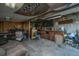 Shed interior features multiple sitting areas, storage cabinets and a window air conditioner at 165 Infinity Dr, Dorchester, SC 29437