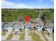 Charming two-story home with a spacious driveway, surrounded by lush greenery, in a peaceful neighborhood at 1800 Poplar Grove Pl, Summerville, SC 29483