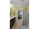 En-suite bath with dual vanity, walk-in shower, and access to the main bedroom at 1800 Poplar Grove Pl, Summerville, SC 29483