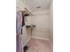 Walk-in closet with carpet flooring and open wire shelving offers plenty of storage for clothing and accessories at 1800 Poplar Grove Pl, Summerville, SC 29483