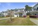 Charming two-story home with a garage and landscaped front yard, adding curb appeal at 1800 Poplar Grove Pl, Summerville, SC 29483