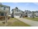 Traditional home with an attached garage and manicured lawn and shrubbery at 1800 Poplar Grove Pl, Summerville, SC 29483