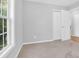 Bedroom featuring neutral walls and a closet with doors at 1810 Laura Creek Rd, Charleston, SC 29412