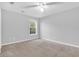 Bedroom features neutral walls and carpet, illuminated by a window at 1810 Laura Creek Rd, Charleston, SC 29412