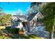 Charming home with solar panels, a two-car garage, and manicured landscaping, offering energy efficiency and curb appeal at 1810 Laura Creek Rd, Charleston, SC 29412
