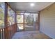 Cozy screened porch with wooden flooring, providing a relaxing outdoor space for enjoying the natural surroundings at 1810 Laura Creek Rd, Charleston, SC 29412