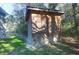 Exterior image of a wooden shed beside a house in a grassy backyard at 1810 Laura Creek Rd, Charleston, SC 29412