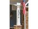 Close-up of the house number '1874' and American flag on the exterior of the home at 1874 Rifle Range Rd, Mount Pleasant, SC 29464
