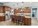 Gourmet kitchen with custom cabinets, granite countertops, stainless steel appliances, and center island at 1874 Rifle Range Rd, Mount Pleasant, SC 29464