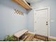Mudroom with coat rack, bench, shelf, and door to the exterior at 1874 Rifle Range Rd, Mount Pleasant, SC 29464