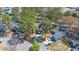 Aerial view of property showcasing landscaping, proximity to neighborhood, and long driveway at 188 Bamert St, Summerville, SC 29483