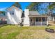 Spacious backyard with screened-in porch, grill, and partial fence, great for outdoor living at 188 Bamert St, Summerville, SC 29483