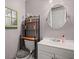 Bathroom with a white vanity and oval mirror at 188 Bamert St, Summerville, SC 29483