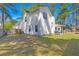 Well-maintained home exterior with vinyl siding, a fenced yard, and an inviting screened-in porch at 188 Bamert St, Summerville, SC 29483
