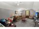 Comfortable living room boasts soft carpet, neutral walls, and cozy seating arrangements at 188 Bamert St, Summerville, SC 29483