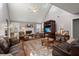 Cozy living room with a fireplace, vaulted ceiling, and comfortable seating at 188 Bamert St, Summerville, SC 29483