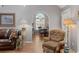 Inviting living room features a decorative archway, hardwood floors, and stylish seating at 188 Bamert St, Summerville, SC 29483