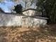 Image of backyard with a door that opens to an exterior storage space at 1907 Helm Ave, North Charleston, SC 29405