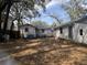 Spacious backyard with some foliage visible and multiple storage spaces at 1907 Helm Ave, North Charleston, SC 29405