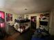 Bedroom with a bunk bed, desk, and storage shelves, ideal for or guests at 1907 Helm Ave, North Charleston, SC 29405