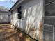 Side view of the property showcasing the exterior and a tin roof at 1907 Helm Ave, North Charleston, SC 29405