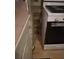 Close-up of a kitchen area highlights a gas range and an adjacent counter at 1907 Helm Ave, North Charleston, SC 29405